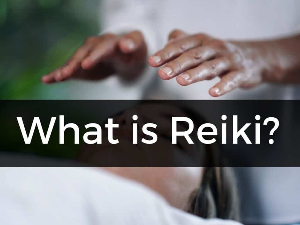 hands hovering over someone's head depicting "what is Reiki?