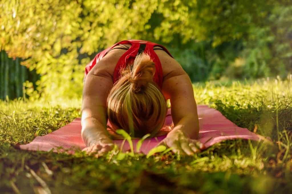 Yoga resources, things I love, woman in yoga pose in the outdoors