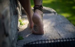 3 Easy Ways to Connect to Nature 6 Bare feet touching the ground is another way to connect to nature through earthing.