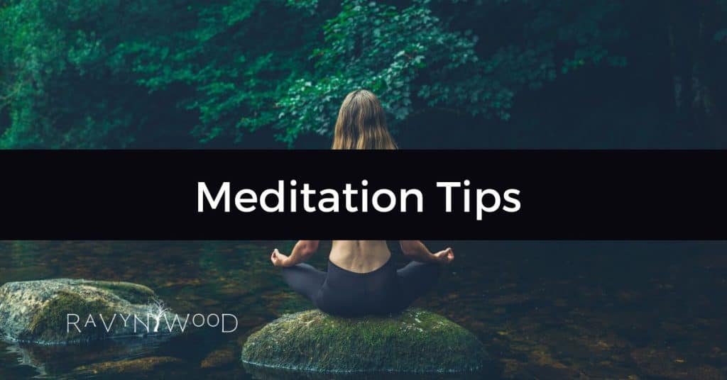 meditation tips text with a a woman facing away from reader meditating at a stream