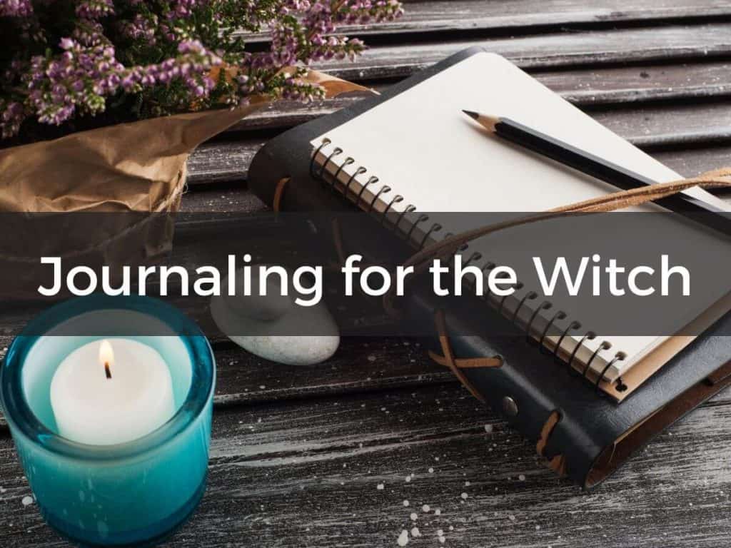 Journaling for the witch. Background is a journal on a tabletop with a candle and a pen. How to create your journaling journey.