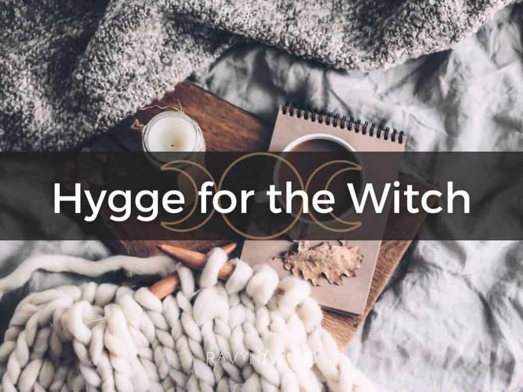 hygge for the winter season, hygge for the witch image shows soft blankets, candle and knitting project